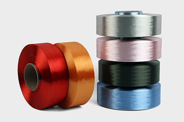 ポリエステル FDY 糸のデニール数は、繊維産業における多用途性と用途にどのような影響を及ぼしますか?